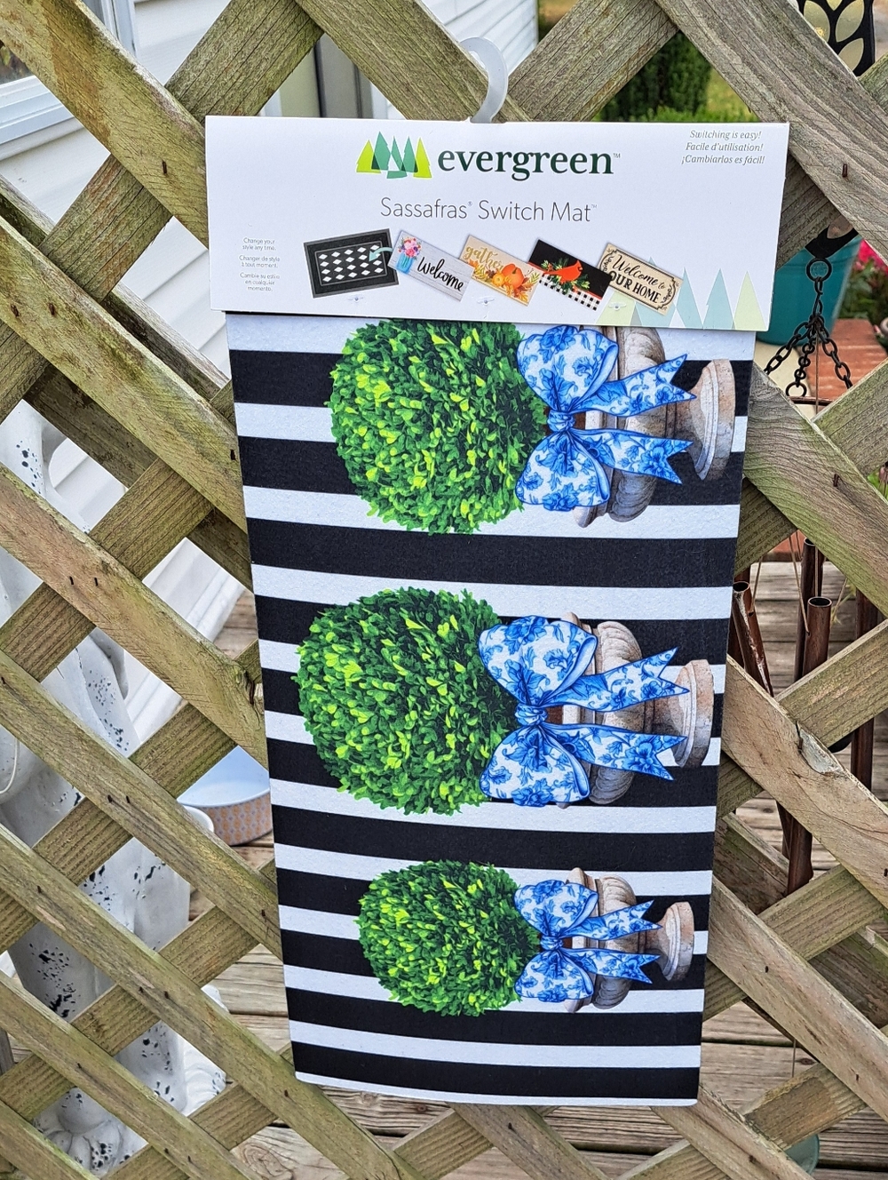 Sassafras Switch Mat - Black & White Stripes with Green Topiary and Blue Ribbon